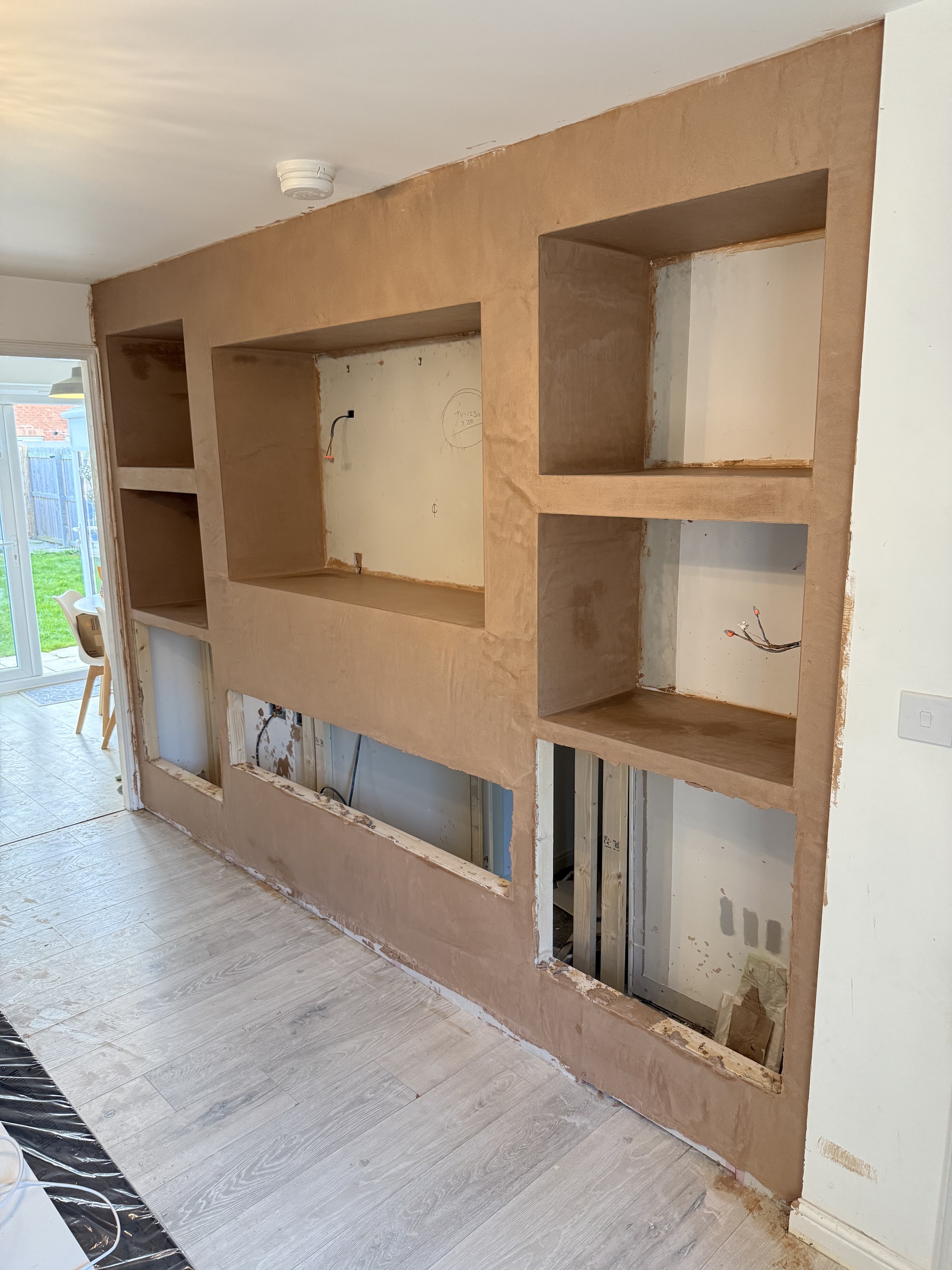 Media wall framework built in MDF with alcoves and shelves taking shape
